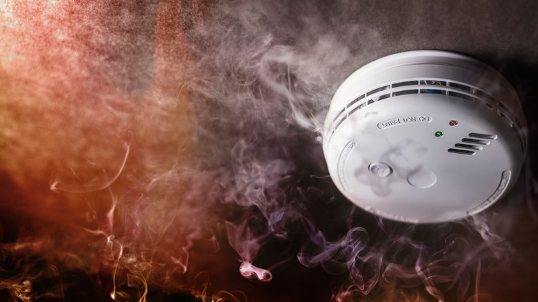 Smoke alarm detecting smoke