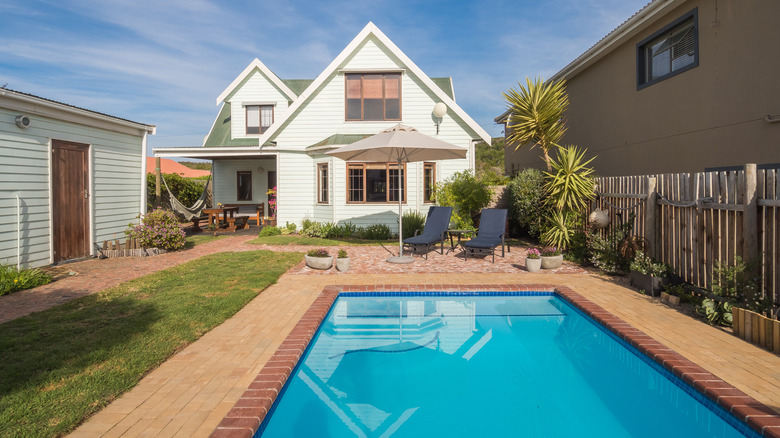 Swimming pool in front yard