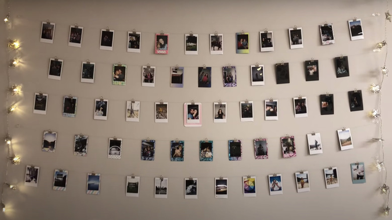 polaroids hanging on string