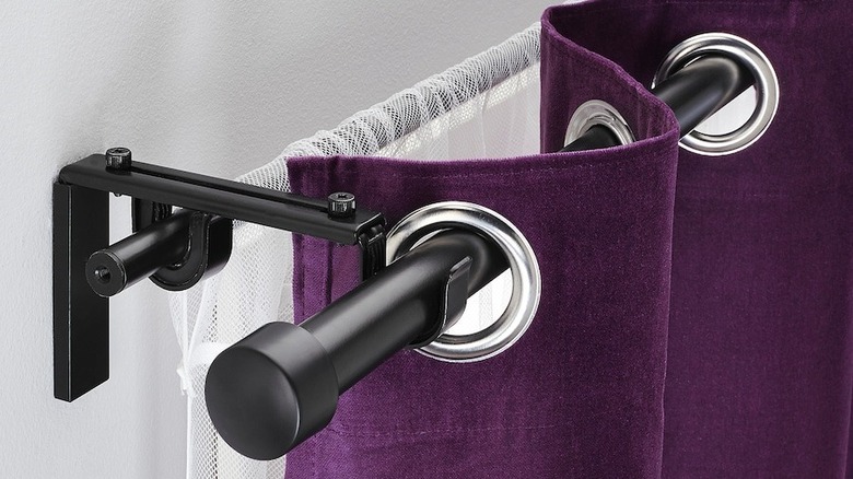 purple curtain on double curtain rod