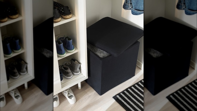 open black storage ottoman