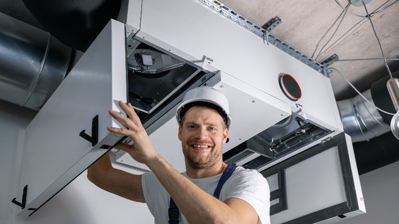 Man working on HVAC system 