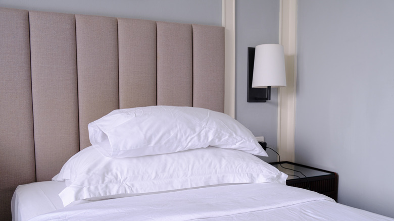 gray headboard and bed