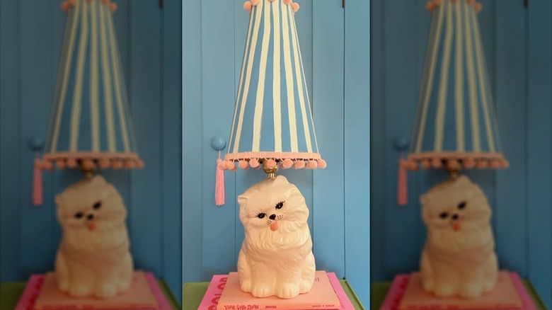 An old cat figurine is turned into a lamp