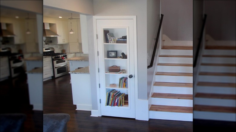 Closet door with bookshelf