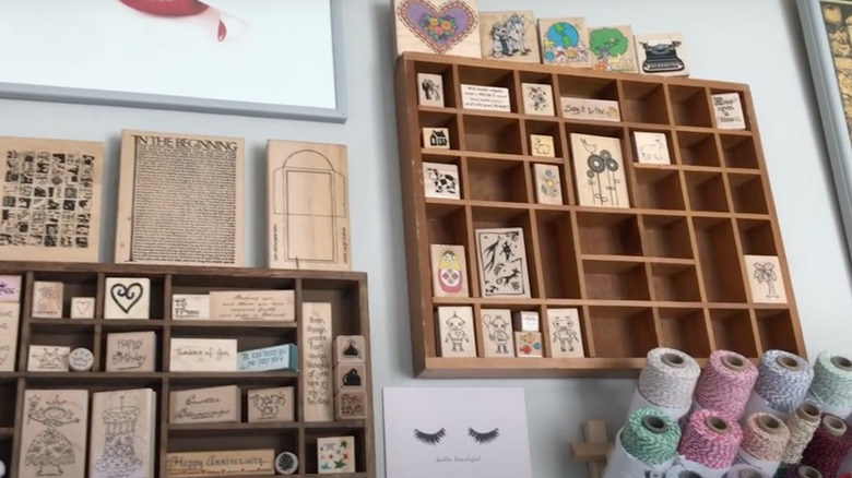 Shadow boxes on walls used for storing stamps