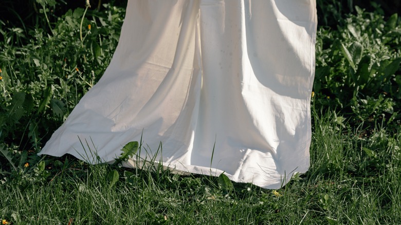 bed sheet hanging in garden