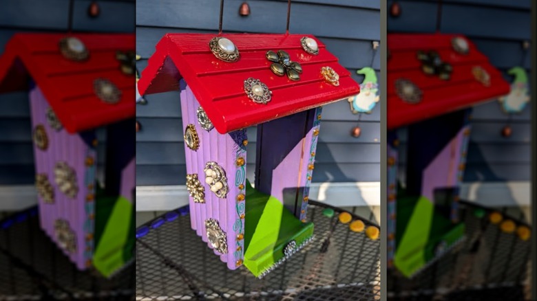 Bird house with vintage jewelry