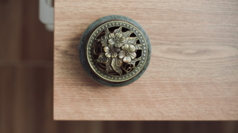 Vintage brooch drawer pull with flowers