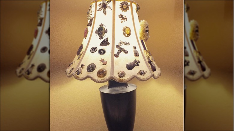 Lamp shade with vintage jewelry pieces