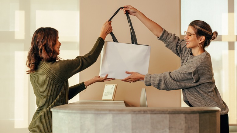 People holding shopping bag