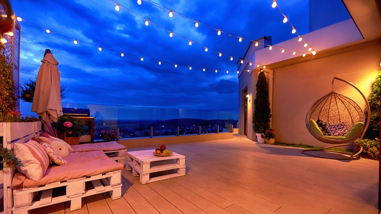 cozy rooftop area at night