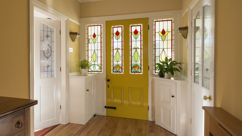 Entryway with stained glass front door