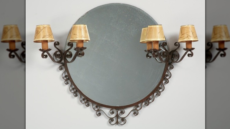 Vintage mirror with sconces