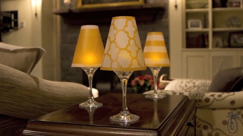 three wine glassed with lampshades