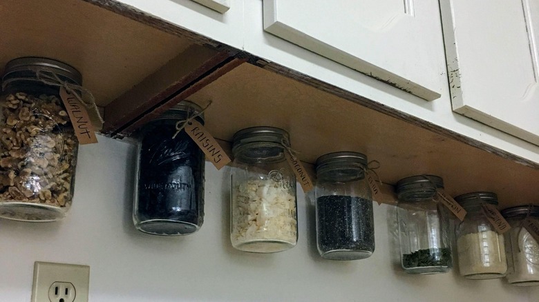 Hanging mason jars in kitchen