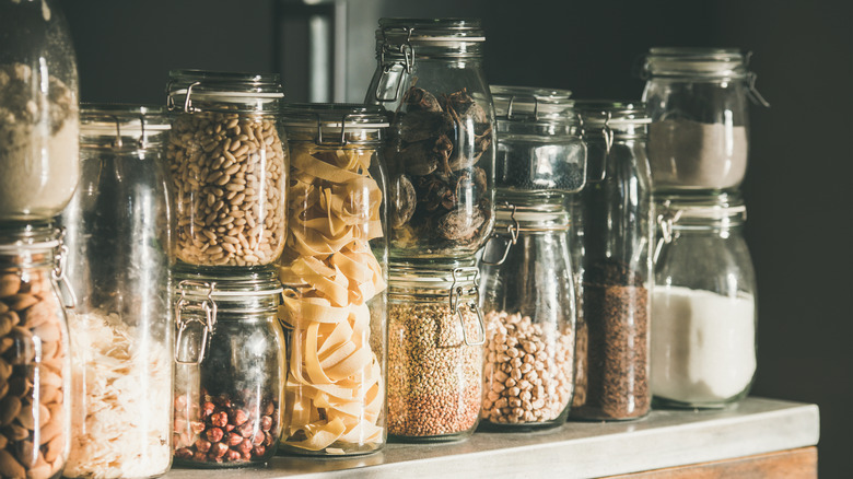 Stacked glass jars full of food