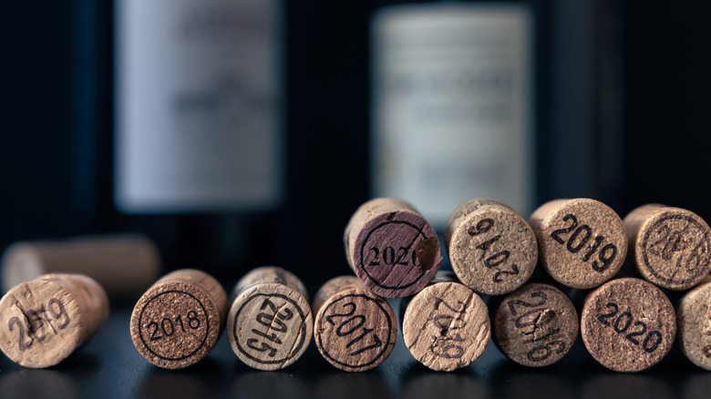 Line of used wine corks with numbers on them