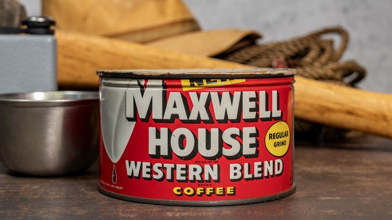 Old red Maxwell House coffee can on counter