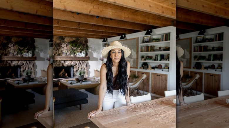 Veronica Valencia posing by table