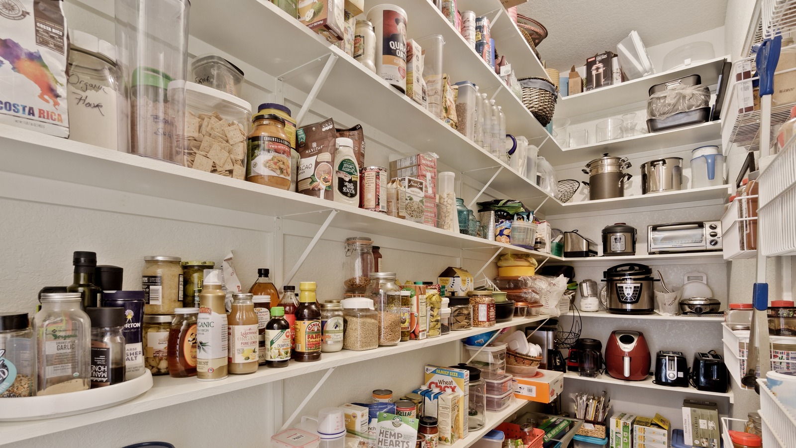 https://www.housedigest.com/img/gallery/revolutionize-your-pantry-storage-with-this-easy-ikea-karaff-hack/l-intro-1704142005.jpg