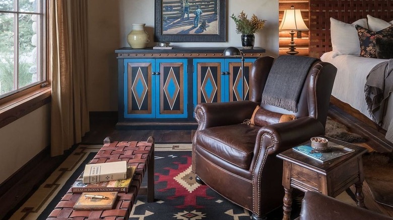 Leather chair in country bedroom