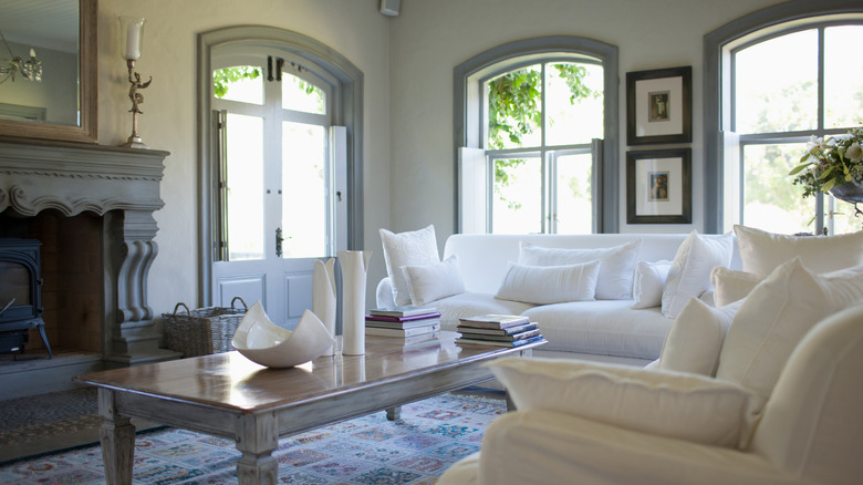 Elegant living room white sofas