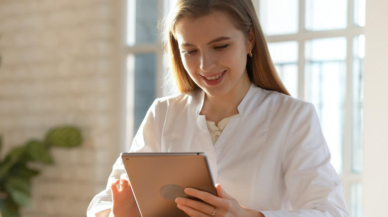 woman with tablet