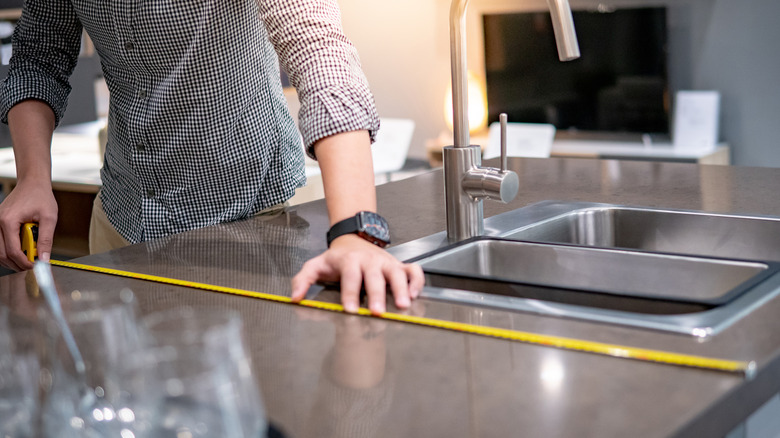 tape measure and kitchen counter