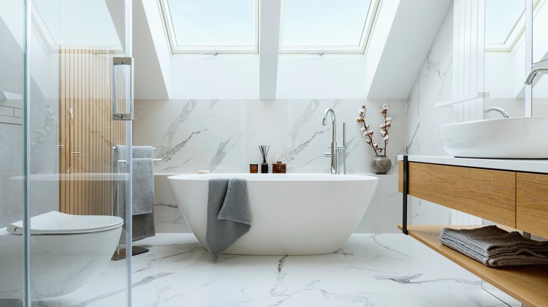 https://www.housedigest.com/img/gallery/rules-to-follow-when-designing-your-bathroom/intro-1699217331.jpg