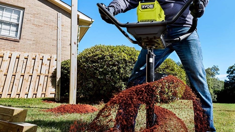 Ryobi auger digging post hole