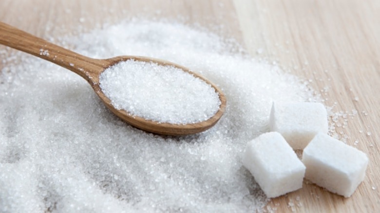 white sugar with a spoon