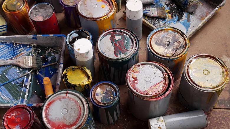 used cans of paint