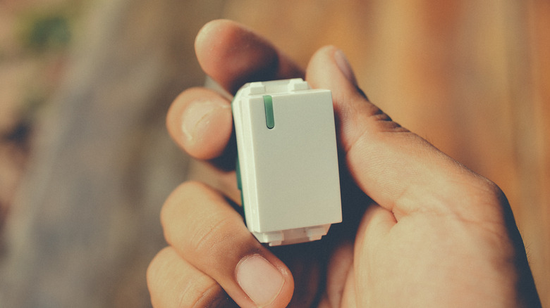 Close-up of a wireless light switch