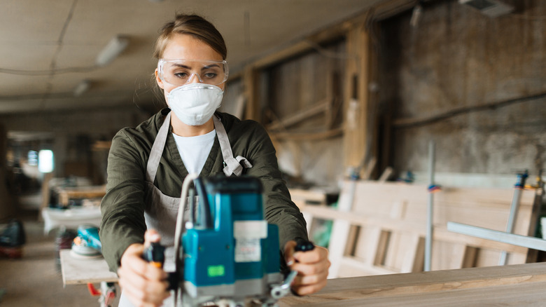 Woodworker sanding wood