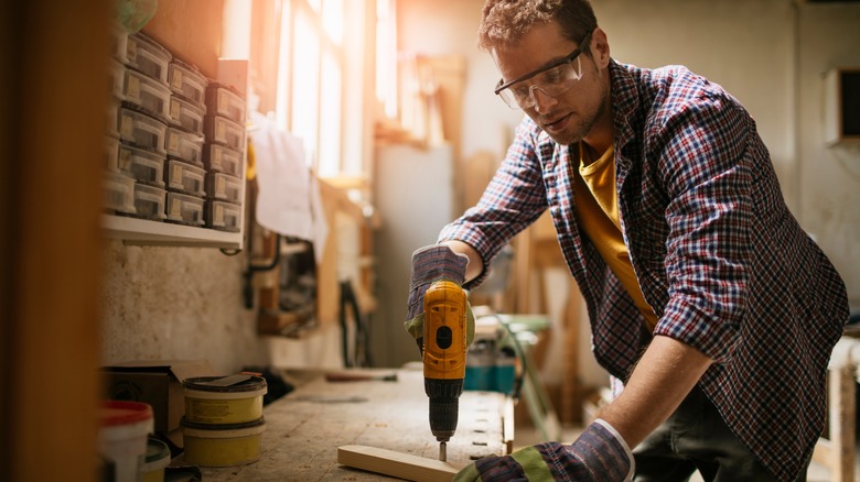 Woodworker wearing safety glasses