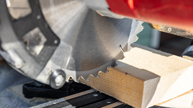 Miter saw tool blade up close for cutting lumber and carpentry