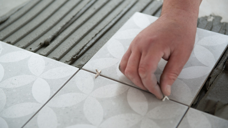 Controlling the grout space between tiles