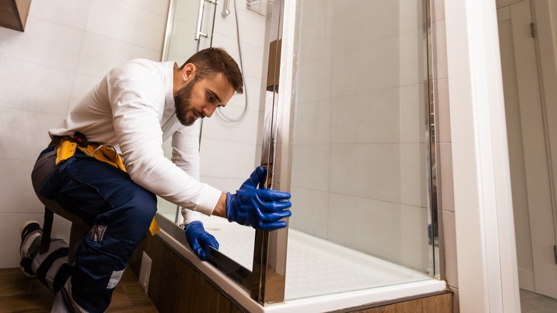 plumber installing shower 