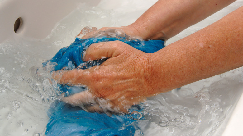 Handwashing blue clothing