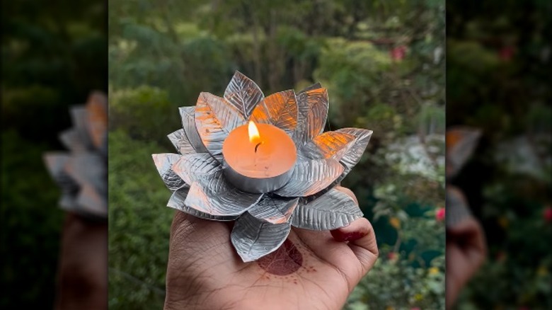 making floral candle holder from tealight tins