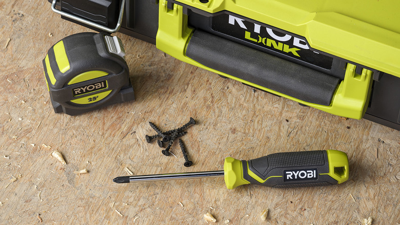 Ryobi screwdriver near a toolbox