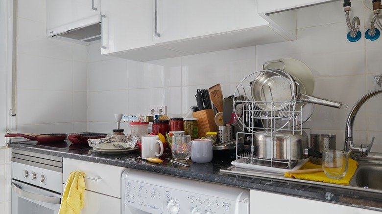 cluttered counters in kitchen