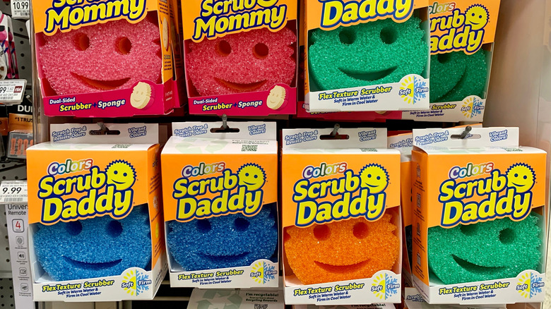 Scrub Daddy sponges hanging in a store