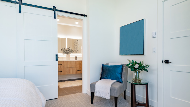 A barn door to a bathroom