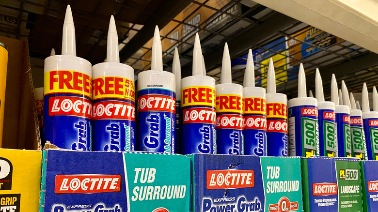 Tubes of caulk on a shelf