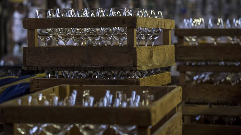 crates with wine glasses