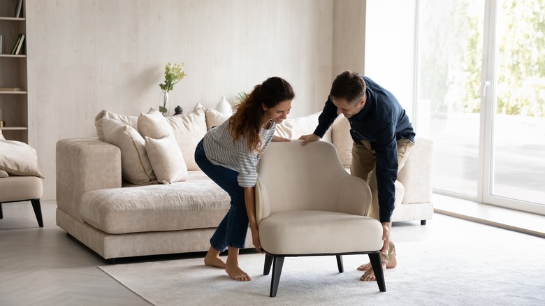 couple setting up chair