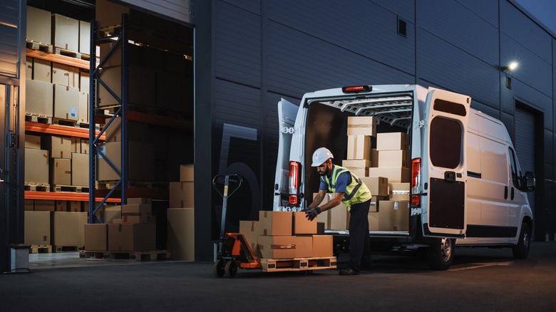 man loading delivery truck