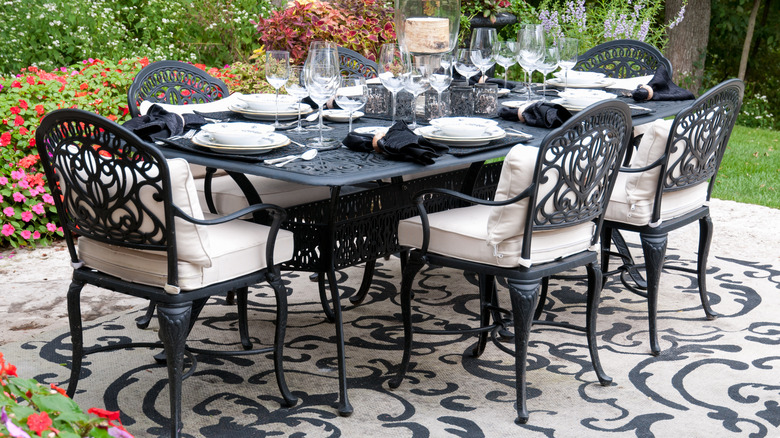 Outdoor dining table with rug